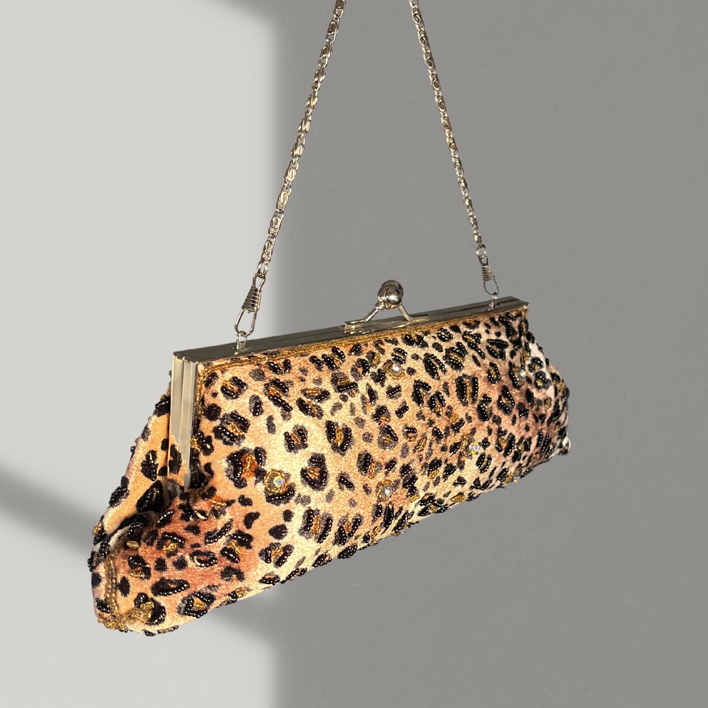 Leopard Essence Clutch